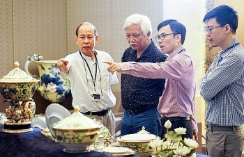 doanh nhan ly ngoc minh linh hon cua gom su minh long i