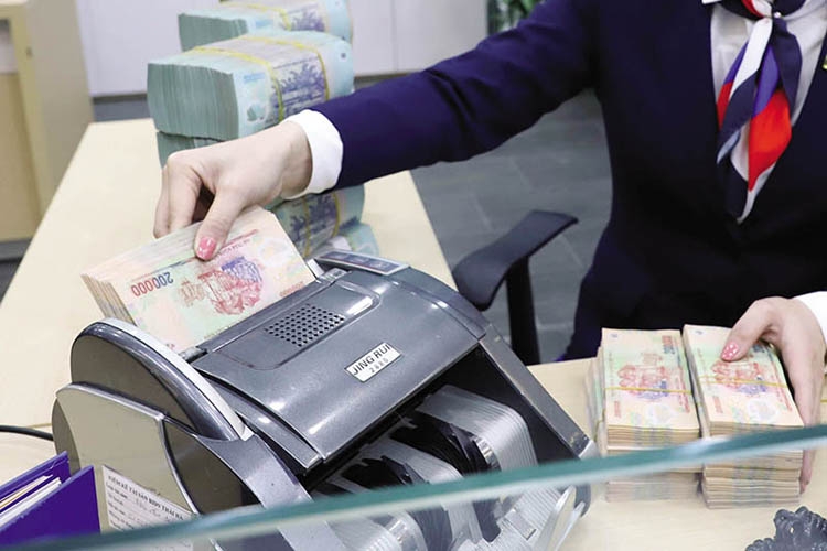 Nâng tỷ lệ bao phủ cao kỷ lục, ngân hàng giảm nỗi lo ẩn số nợ xấu