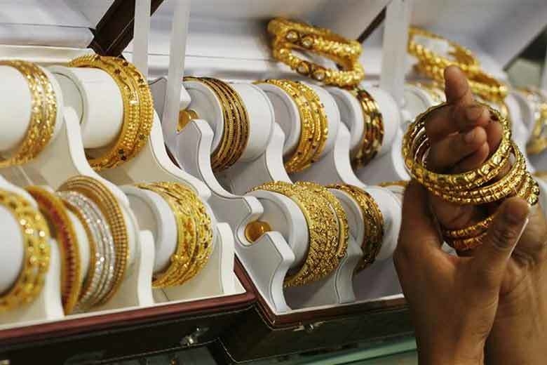 Giá vàng hôm nay 26/5: Vàng giảm mạnh xuống dưới 70 triệu/lượng